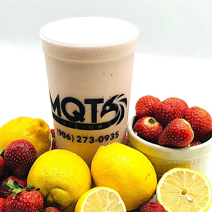 smoothie with lemons and strawberries on a white background